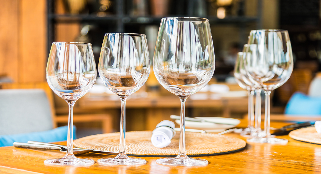 Selectiv soft focus on Wine glass on dining table in restaurant